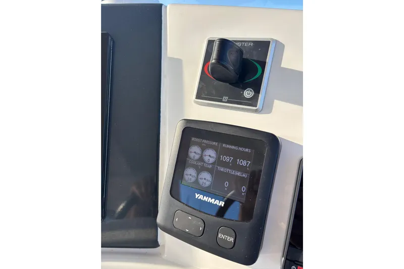  Yacht Photos Pics Control panel of a 2022 Leopard 46 Powercat with Yanmar display and throttle control.