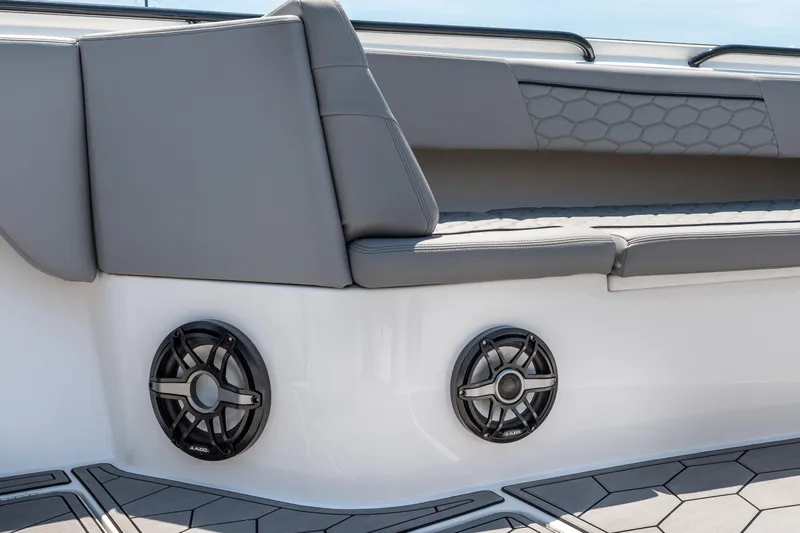  Yacht Photos Pics 2023 Fountain 38 SC boat interior with gray seating and built-in speakers.