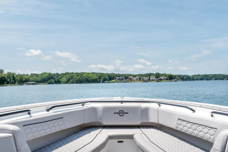 Yacht Photos Pics 2023 Fountain 38 SC boat interior with lake view and clear sky.