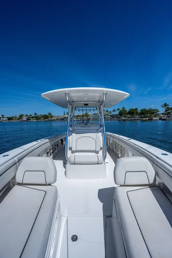  Yacht Photos Pics 2013 Jupiter 34 boat on calm water under clear blue sky.