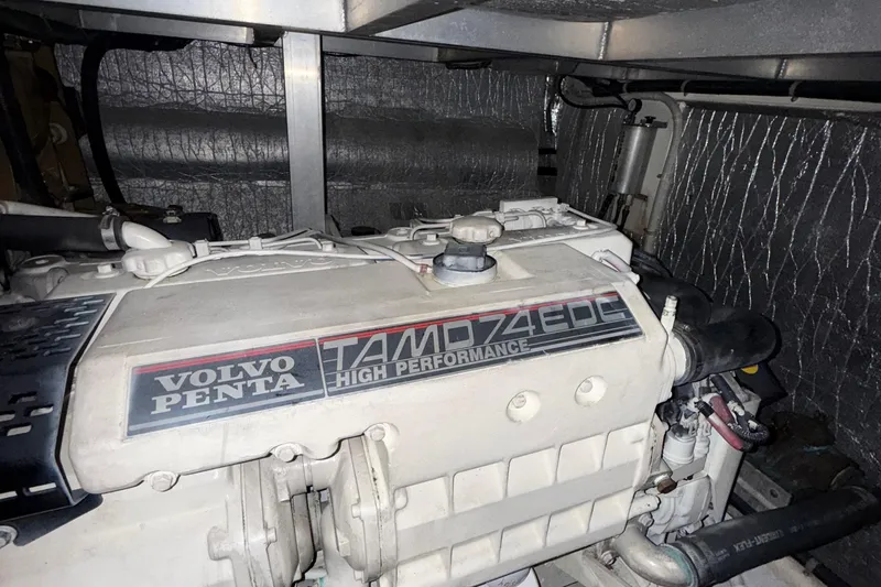The Motley Crew Yacht Photos Pics Volvo Penta TAMD74 EDC engine in 2003 Rival 5700 Navigator boat.