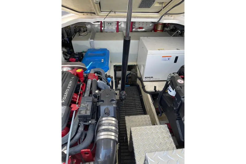 Borabora III Yacht Photos Pics Engine compartment of 2007 Regal Commodore 3760 IB with Volvo Penta and Kohler systems.