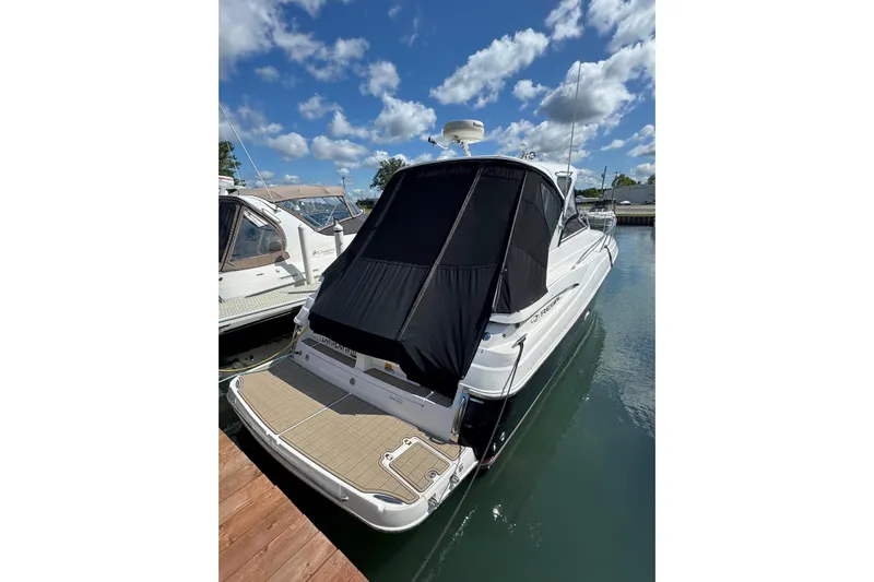 Borabora III Yacht Photos Pics 2007 Regal Commodore 3760 IB yacht docked under a clear blue sky.