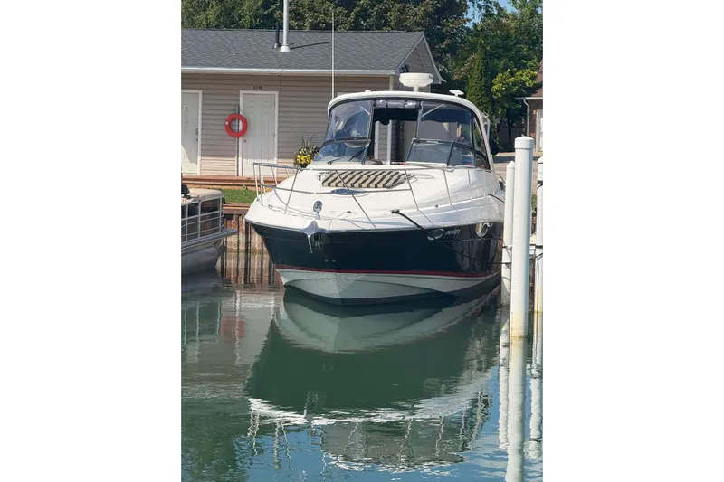 Borabora III Yacht Photos Pics 2007 Regal Commodore 3760 IB boat docked at marina, front view.