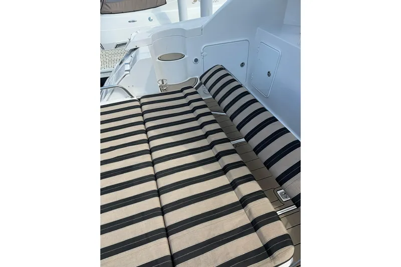 Borabora III Yacht Photos Pics Striped seating on 2007 Regal Commodore 3760 IB boat deck.