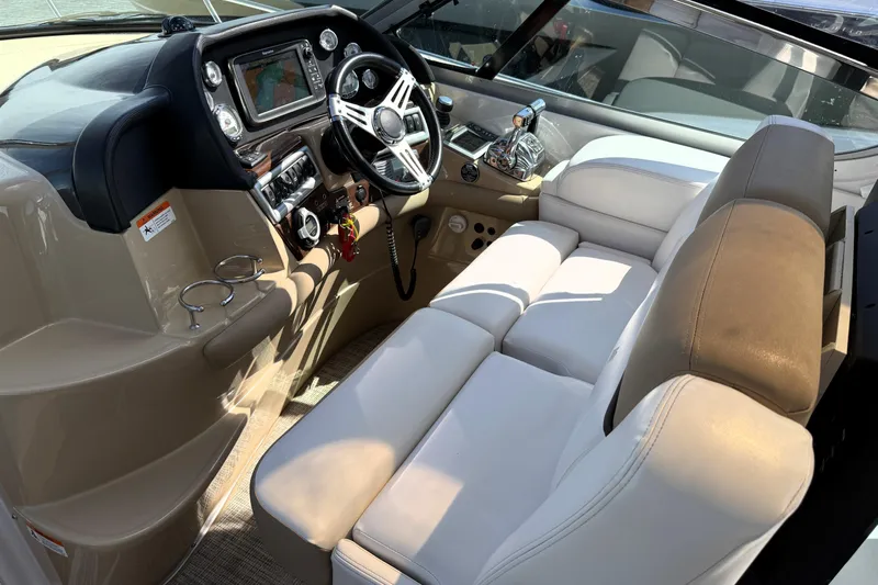  Yacht Photos Pics 2013 Four Winns Vista 375 boat cockpit with modern controls and comfortable seating.