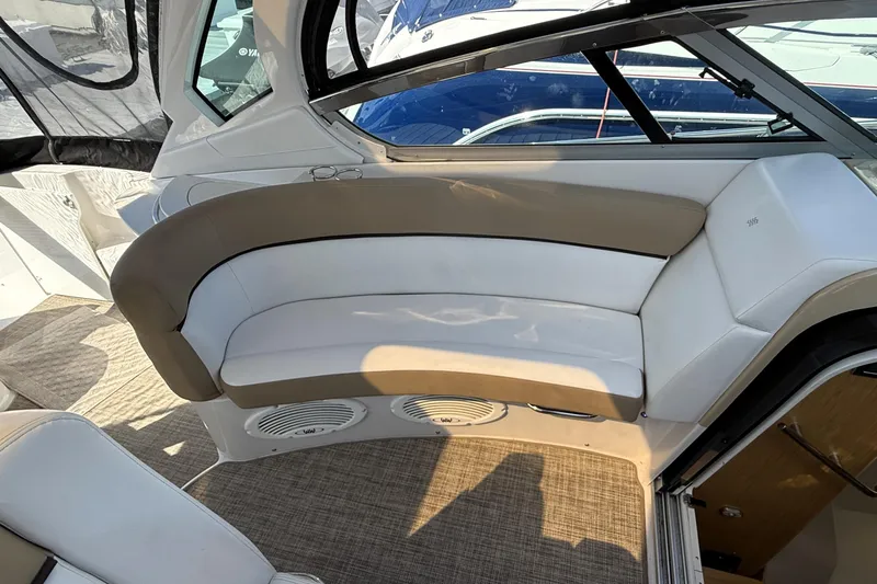  Yacht Photos Pics 2013 Four Winns Vista 375 interior with curved seating and modern design.