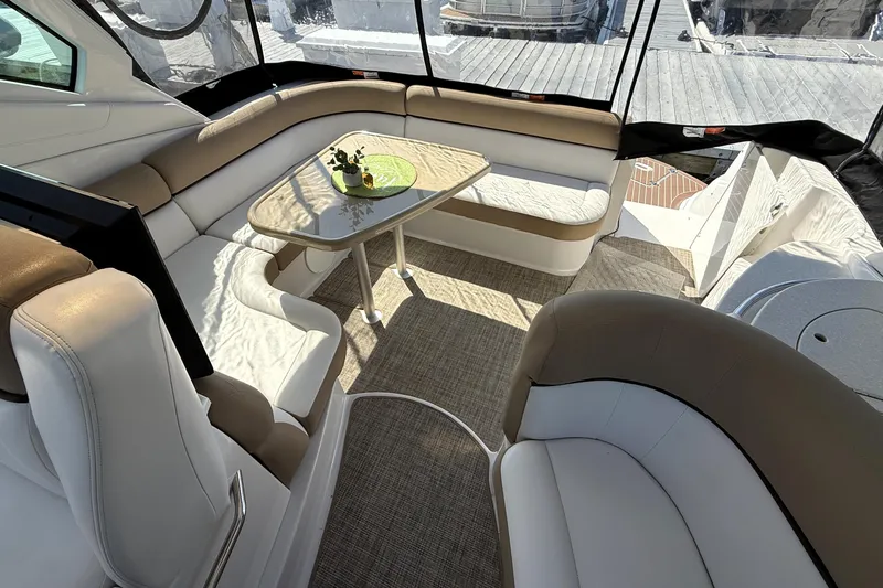  Yacht Photos Pics Luxurious interior of 2013 Four Winns Vista 375 yacht with elegant seating and table.