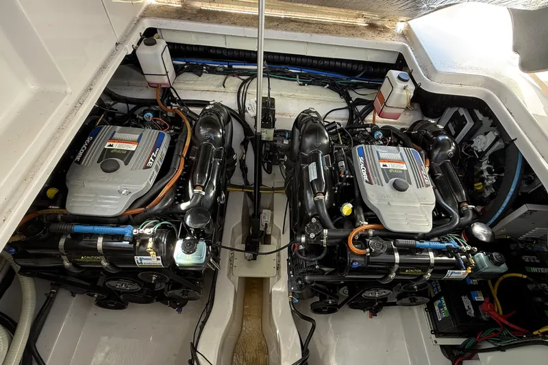  Yacht Photos Pics Engine compartment of a 2013 Four Winns Vista 375 boat, featuring dual MerCruiser engines.
