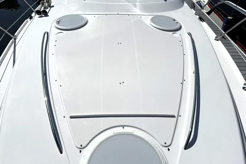  Yacht Photos Pics 2013 Four Winns Vista 375 boat deck, featuring sleek design and circular hatches.