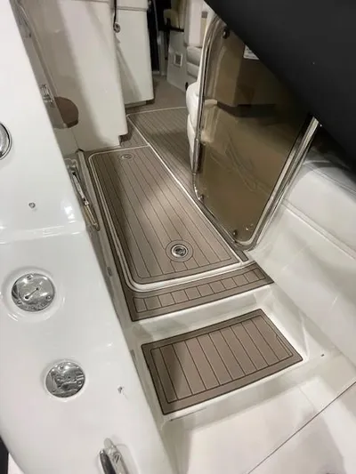  Yacht Photos Pics 2014 Sea Ray 410 Sundancer boat interior with sleek wood flooring and modern design.