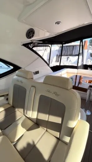  Yacht Photos Pics 2014 Sea Ray 410 Sundancer interior with beige seating and modern design.