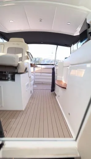  Yacht Photos Pics 2014 Sea Ray 410 Sundancer interior with sleek design and comfortable seating.