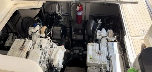  Yacht Photos Pics Engine compartment of 2014 Sea Ray 410 Sundancer with dual engines and fire extinguisher.