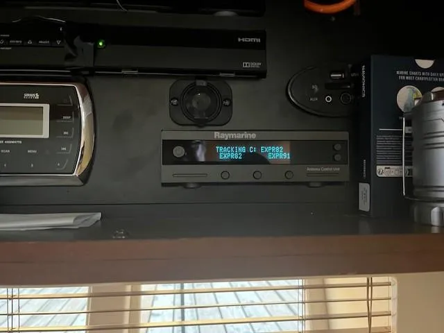  Yacht Photos Pics Control panel on a 2014 Sea Ray 410 Sundancer yacht, featuring Raymarine electronics.