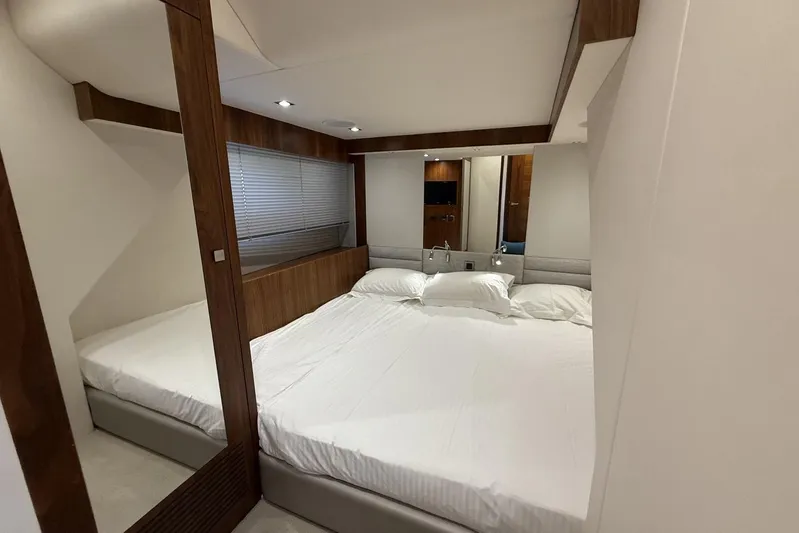 M/y Bishwish Yacht Photos Pics Luxurious bedroom interior of 2018 Sunseeker Manhattan 66 yacht with modern design.