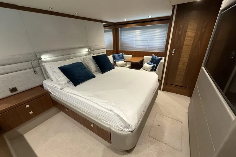 M/y Bishwish Yacht Photos Pics Luxurious bedroom interior of 2018 Sunseeker Manhattan 66 yacht with elegant furnishings.