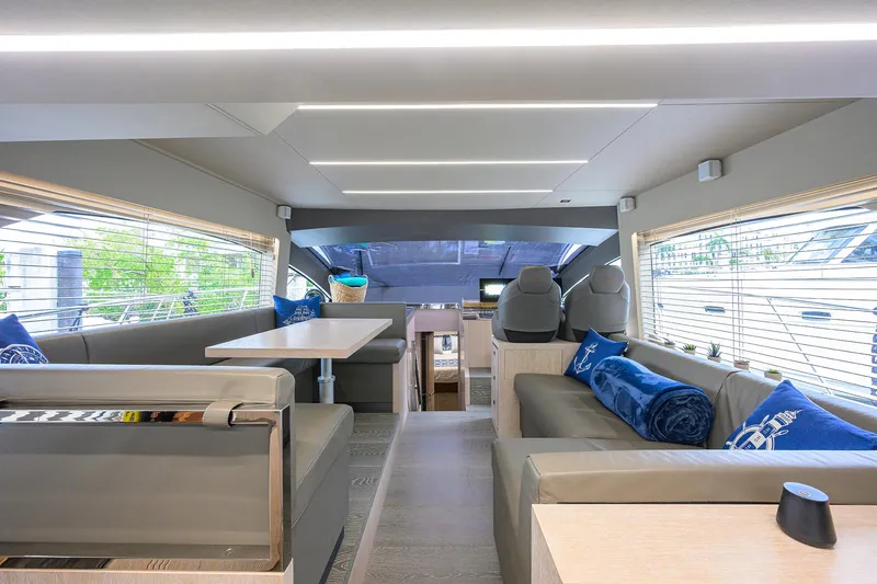 Harbour Time Yacht Photos Pics Luxurious interior of 2021 Astondoa 52 yacht with modern seating and elegant decor.