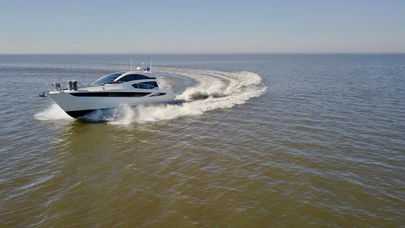 Docside Yacht Photos Pics 2021 Galeon 430 HTC yacht cruising on open water.