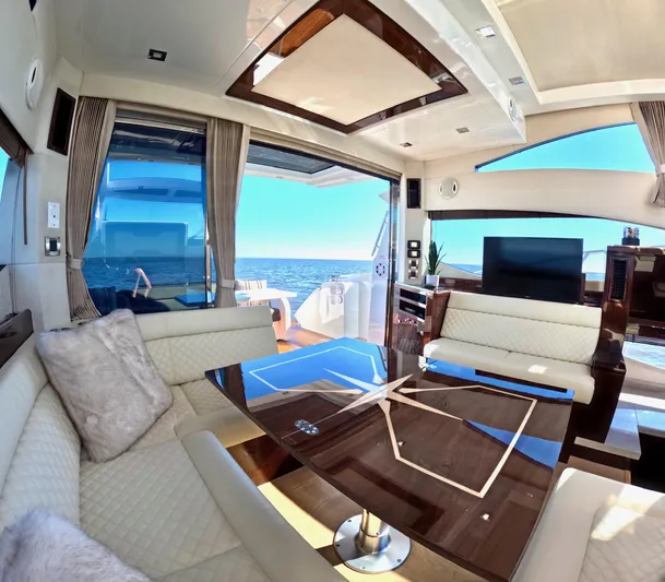 Docside Yacht Photos Pics Luxurious interior of 2021 Galeon 430 HTC yacht with ocean view.