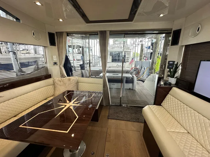 Docside Yacht Photos Pics Interior of 2021 Galeon 430 HTC yacht with elegant seating and modern design.