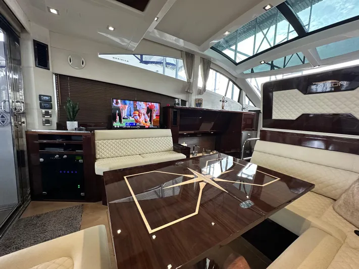 Docside Yacht Photos Pics Luxurious interior of 2021 Galeon 430 HTC yacht with elegant seating and modern amenities.