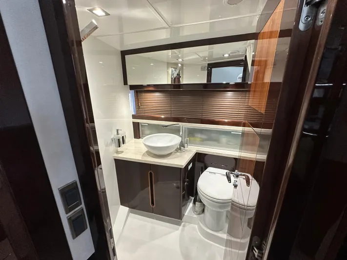 Docside Yacht Photos Pics Luxurious bathroom in 2021 Galeon 430 HTC yacht with modern fixtures and elegant design.