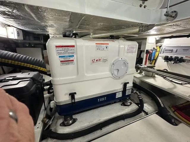 Docside Yacht Photos Pics Engine room of 2021 Galeon 430 HTC yacht, featuring a 12 mini generator.