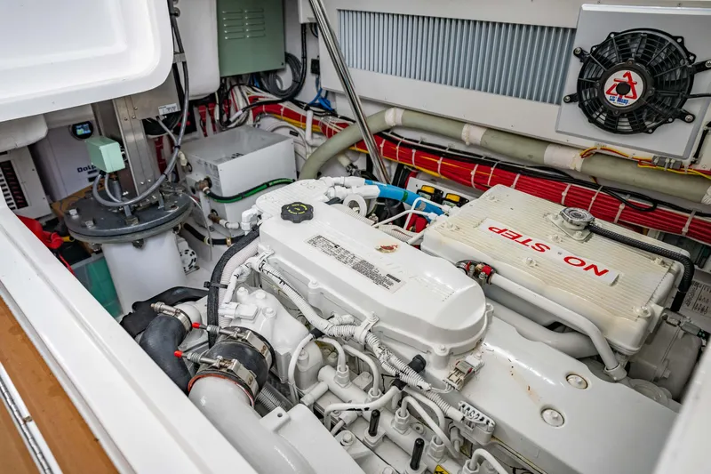 Fin Planner II Yacht Photos Pics Engine room of 2021 Viking 38 Billfish boat, showcasing clean and organized machinery.