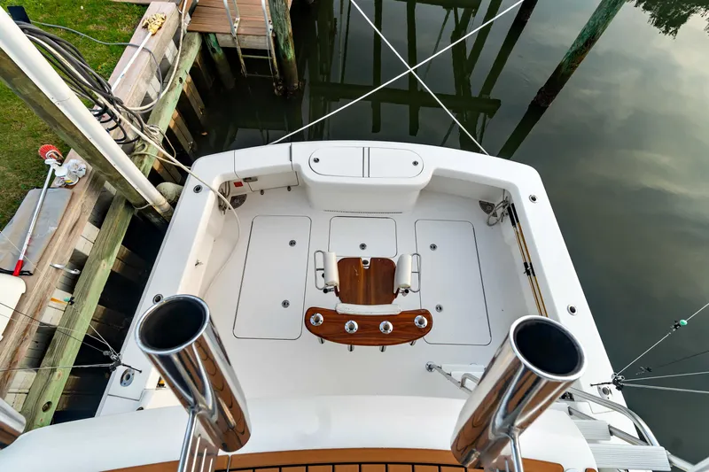 Fin Planner II Yacht Photos Pics 2021 Viking 38 Billfish boat deck with fishing chair and rod holders.