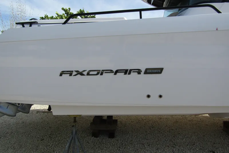  Yacht Photos Pics 2024 Axopar 45 XC Cross Cabin BRABUS Trim, side view with logo.
