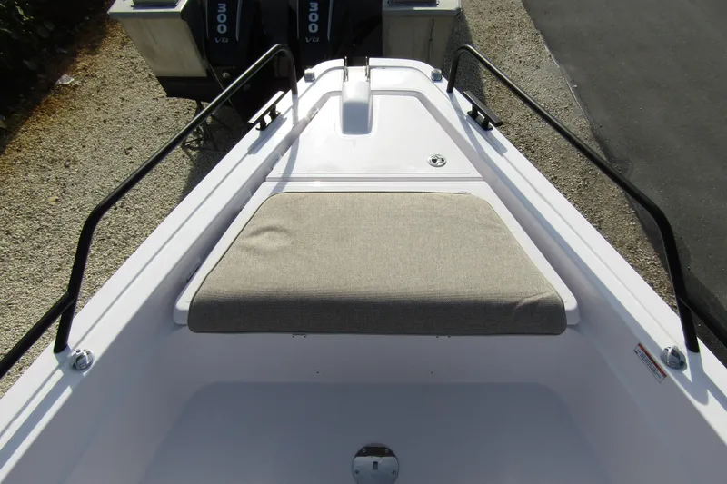  Yacht Photos Pics 2024 Axopar 45 XC Cross Cabin BRABUS Trim, bow seating area with dual outboard engines.