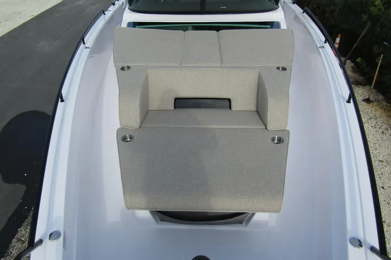  Yacht Photos Pics 2024 Axopar 45 XC Cross Cabin BRABUS Trim with cushioned seating area.