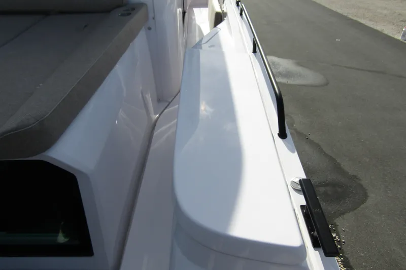  Yacht Photos Pics 2024 Axopar 45 XC Cross Cabin BRABUS Trim, deck view with seating and railing.