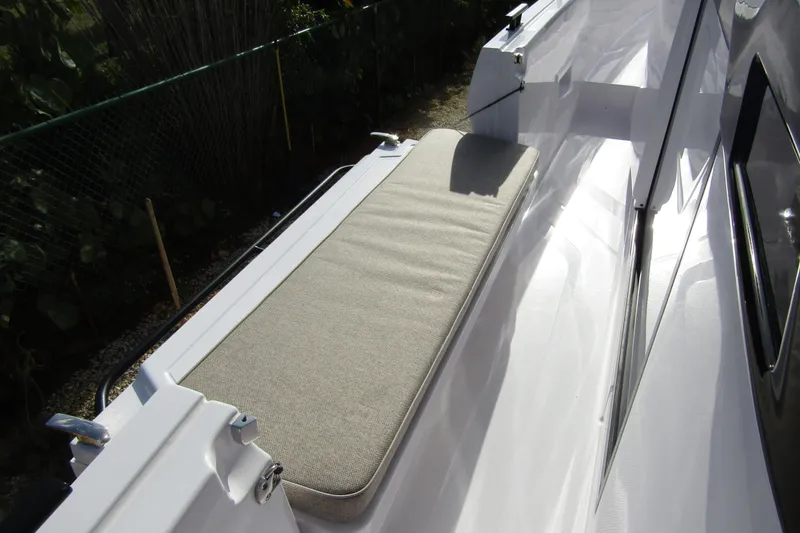  Yacht Photos Pics 2024 Axopar 45 XC Cross Cabin BRABUS Trim with sleek deck seating.