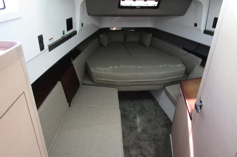  Yacht Photos Pics 2024 Axopar 45 XC Cross Cabin BRABUS Trim interior with cozy sleeping area.
