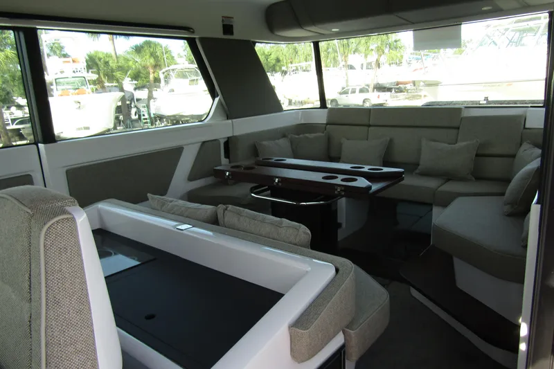  Yacht Photos Pics Luxurious interior of 2024 Axopar 45 XC Cross Cabin BRABUS Trim with plush seating.