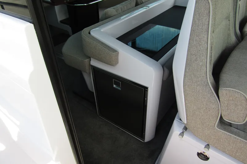  Yacht Photos Pics 2024 Axopar 45 XC Cross Cabin BRABUS Trim interior seating and storage detail.