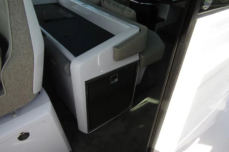  Yacht Photos Pics Interior of 2024 Axopar 45 XC Cross Cabin BRABUS Trim, featuring sleek seating and cabinetry.