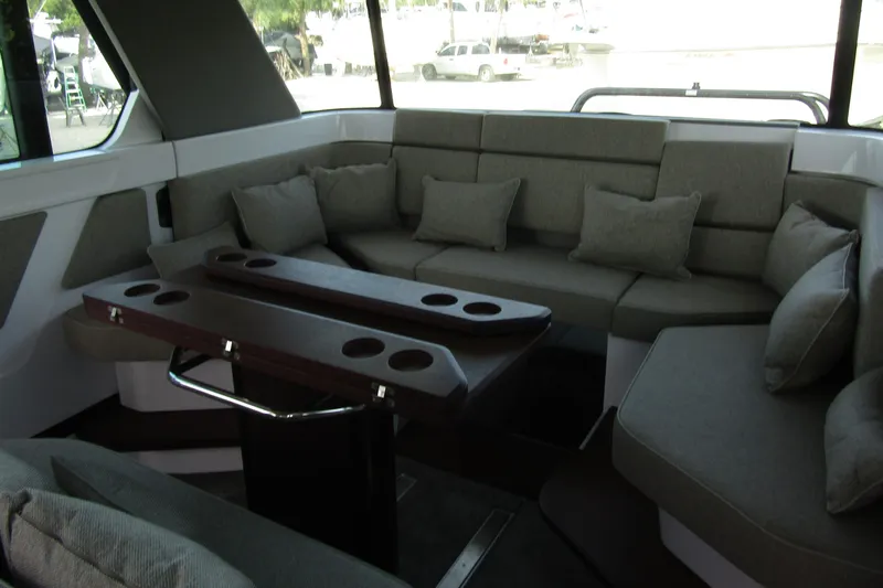  Yacht Photos Pics Luxurious interior of 2024 Axopar 45 XC Cross Cabin with BRABUS trim, featuring plush seating.