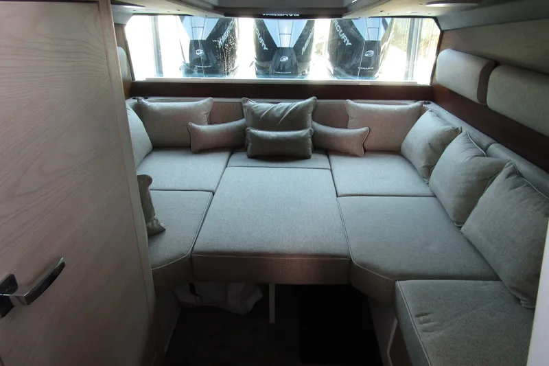  Yacht Photos Pics Luxurious interior of 2024 Axopar 45 XC Cross Cabin BRABUS Trim with plush seating.