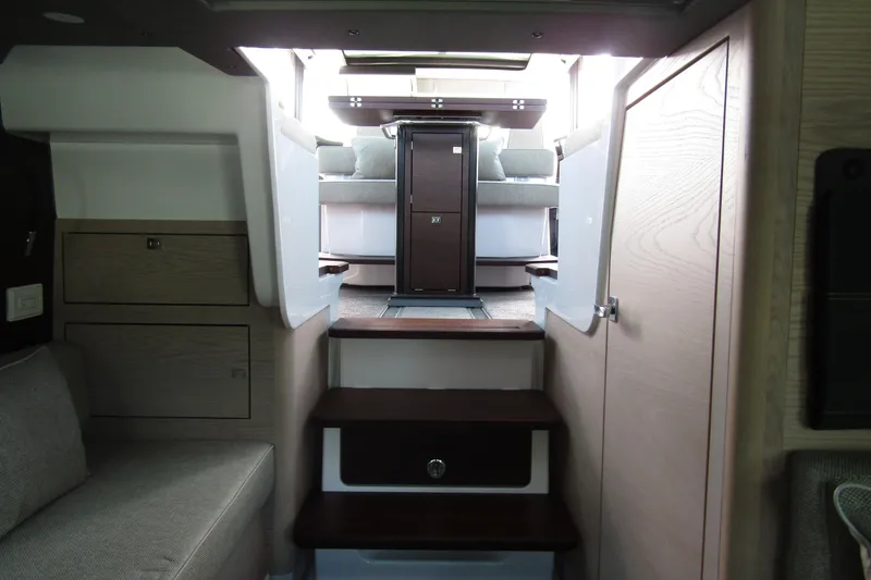  Yacht Photos Pics 2024 Axopar 45 XC Cross Cabin interior with modern design and wooden accents.