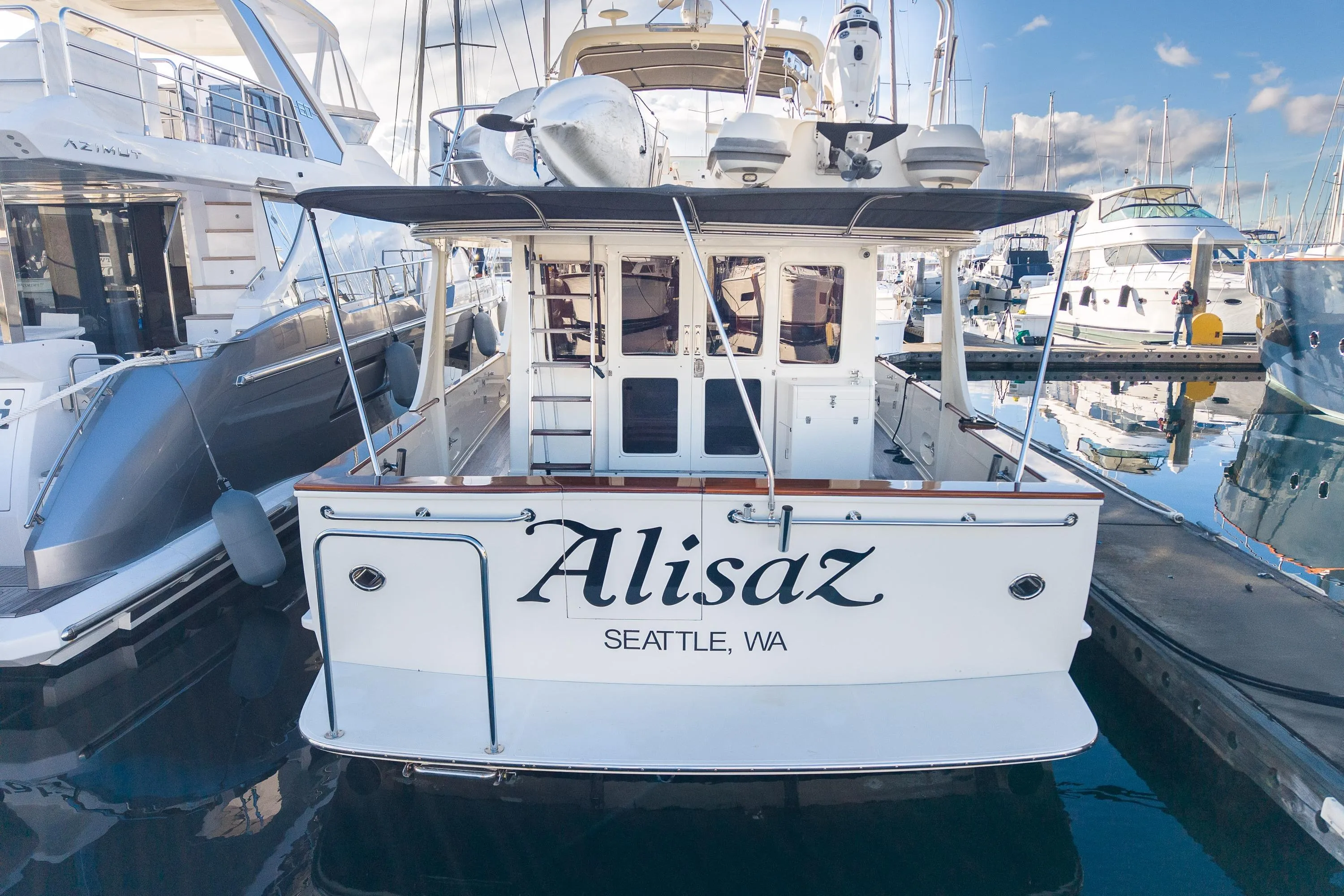 Fleming 55 Pilothouse yacht docked, rear view, named "Alisaz," Seattle, WA, 2001 model.