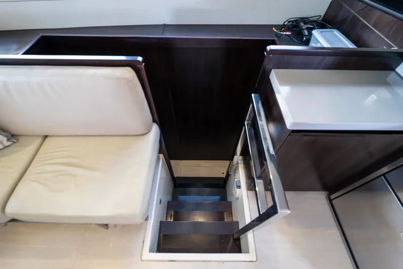  Yacht Photos Pics Interior of 2014 Leopard 51 Powercat, featuring stairs and seating area.