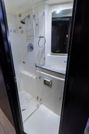  Yacht Photos Pics Bathroom interior of 2014 Leopard 51 Powercat yacht, featuring shower and sink.
