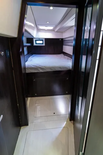  Yacht Photos Pics 2014 Leopard 51 Powercat cabin interior with bed and modern design.