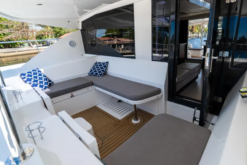  Yacht Photos Pics 2014 Leopard 51 Powercat yacht with outdoor seating and modern interior design.