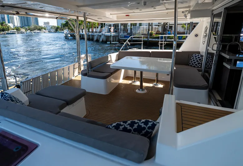  Yacht Photos Pics Spacious deck of 2014 Leopard 51 Powercat with comfortable seating and waterfront view.