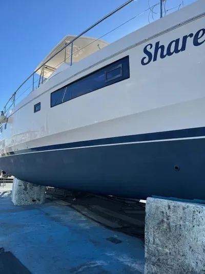  Yacht Photos Pics 2014 Leopard 51 Powercat yacht on dry dock, side view.