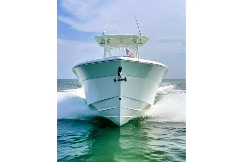  Yacht Photos Pics 2017 Sea Fox 328 Commander boat cruising on open water.